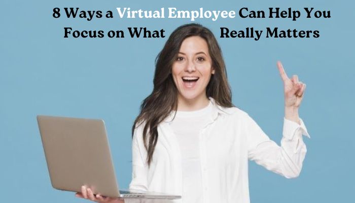 Smiling woman holding a laptop and pointing upward, representing the benefits of hiring a virtual employee for improved focus and productivity.